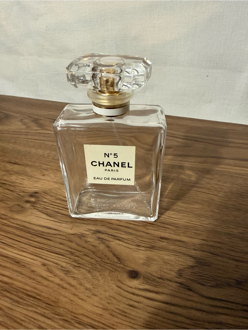 CHANEL Clear Glass Decorative Bottle with Gold Accents, empty